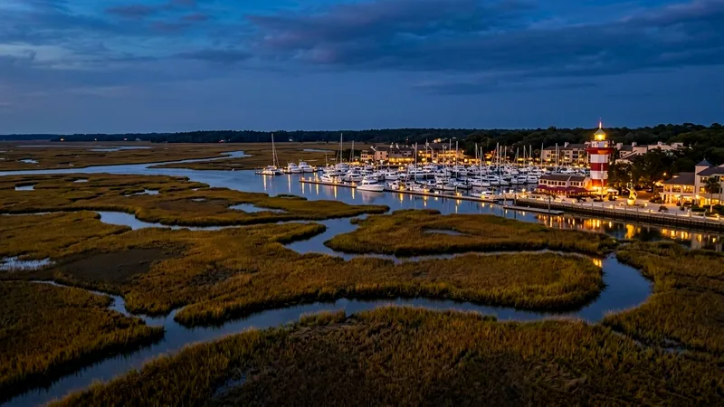 Salt marsh channels leading to Shelter Cove marina at dusk.